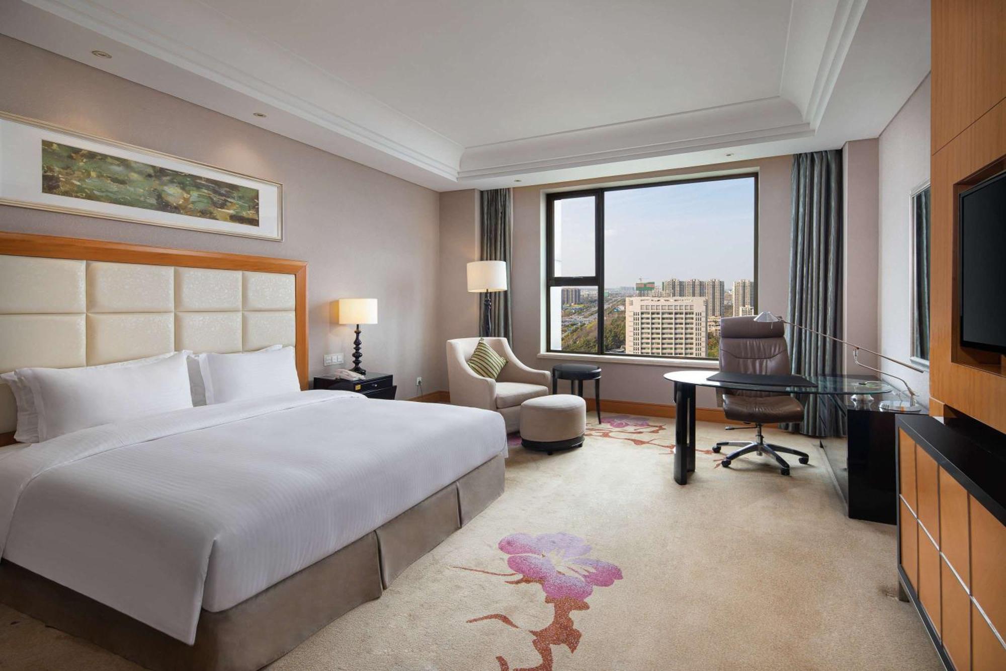 فندق Wyndham Xinyang Downtown المظهر الخارجي الصورة